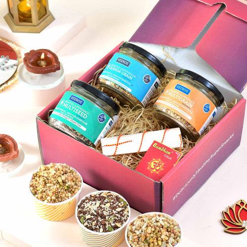 Keeros Healthy Bhai Dooj Gift for Brother with Roli Moli Chandan Tikka Chawal Mishri Pack & 2 Beautiful Diyas | Combo of Sweet & Salted, Tasty & Nutritious Super Snacks in Elegant Glass Jars Packed in Premium Gift Hamper