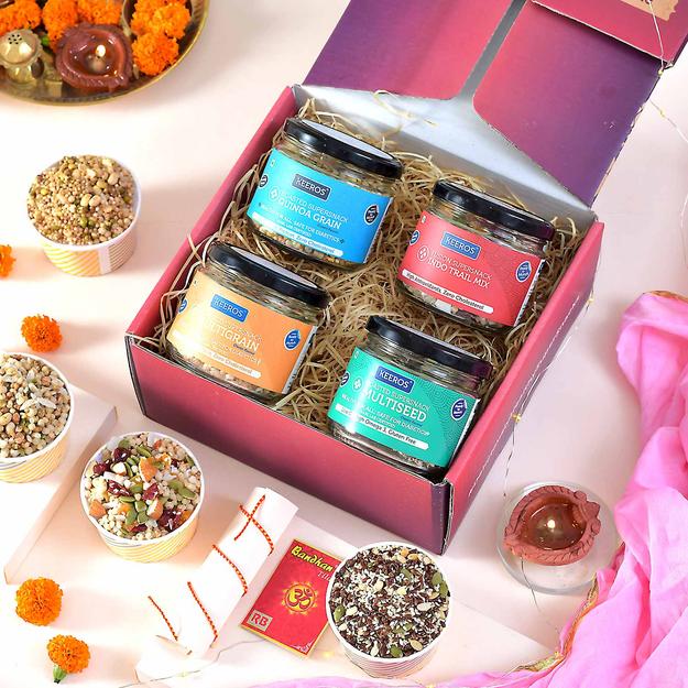 Keeros Healthy Bhai Dooj Gift Hamper for Brother with Roli Moli Chandan Tikka Chawal Mishri Pack | Combo of Sweet & Salted, Tasty & Nutritious Super Snacks in Glass Jars Packed in a Beautiful Gift Hamper