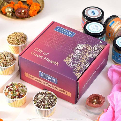 Keeros Healthy Diwali Gift Hamper for Friends & Family | Combo of Sweet & Salted, Tasty & Nutritious Super Snacks in Glass Jars Packed in a Beautiful Gift Hamper