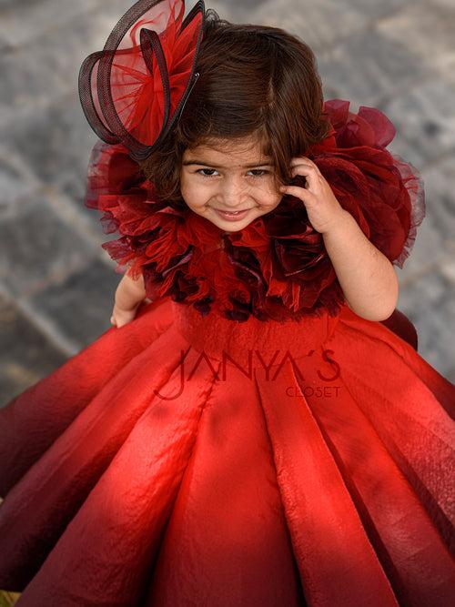 Shaded Red Couture Gown With Hair Accessory