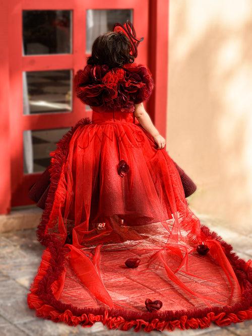 Shaded Red Couture Gown With Hair Accessory