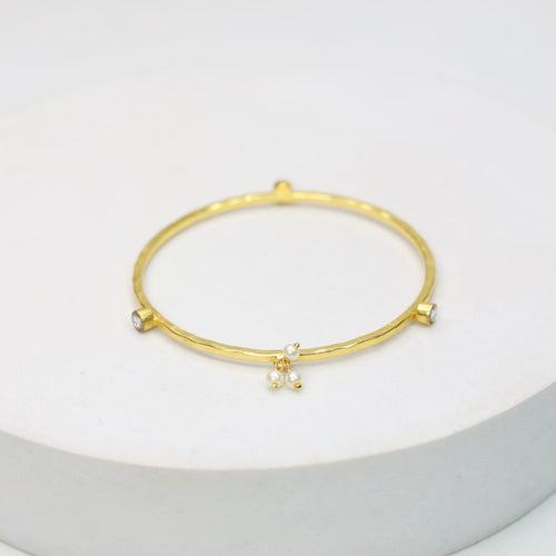 Stacking Bracelet/Bangle in
92.5 sterling silver bangle, 18 karat Gold plated with Billor Polki and Pearls