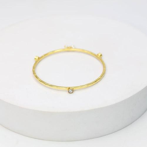 Stacking Bracelet/Bangle in
92.5 sterling silver bangle, 18 karat Gold plated with Billor Polki and Pearls