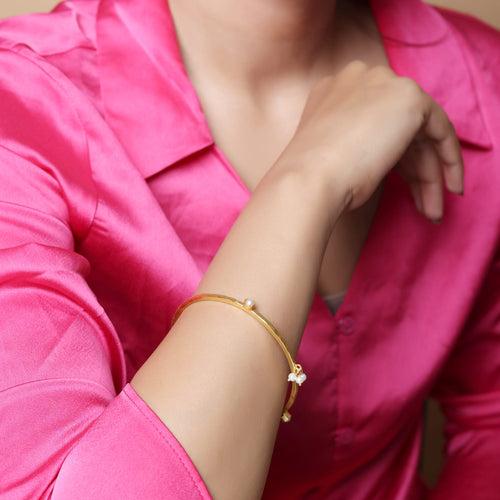 Stacking Bracelet/Bangle in
92.5 sterling silver bangle, 18 karat Gold plated with Billor Polki and Pearls