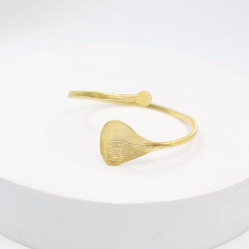 Textured leaf bracelet
Handcrafted sterling silver bracelet with 1 micron gold plating in Open stacking bracelet.
Size- Adjustable