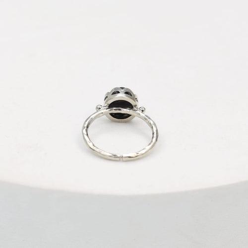 Sterling Silver ring in carved stone with an elegant look, adjustable.