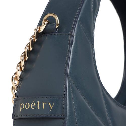 Poetry quilted shoulder bag