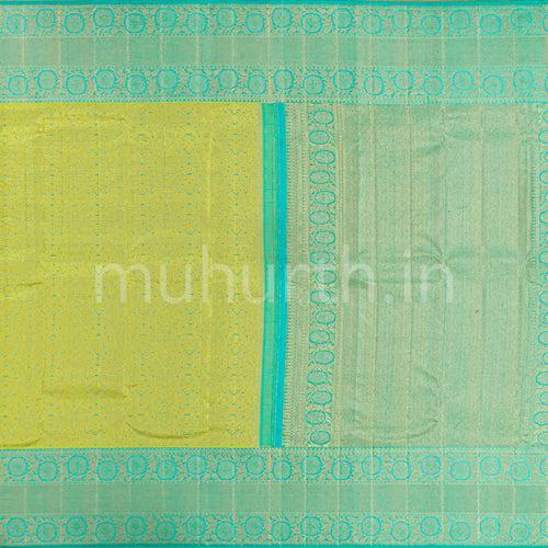 Kanjivaram Sampanga Yellow Silk Saree with Sea Green