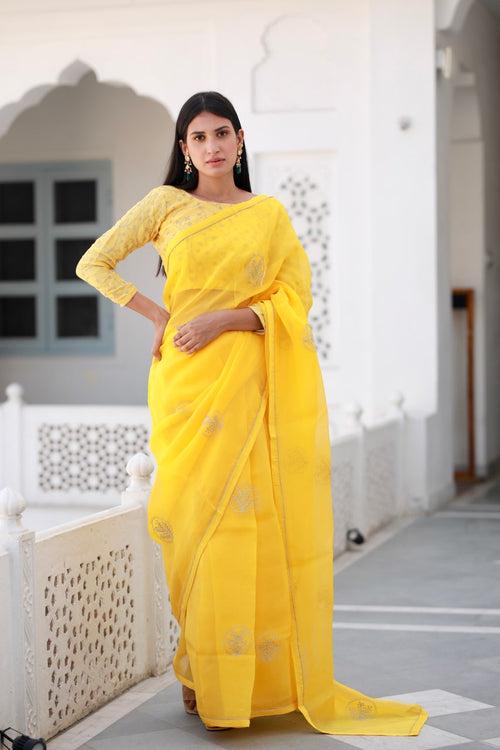 Shreeja yellow viscose silk organza saree