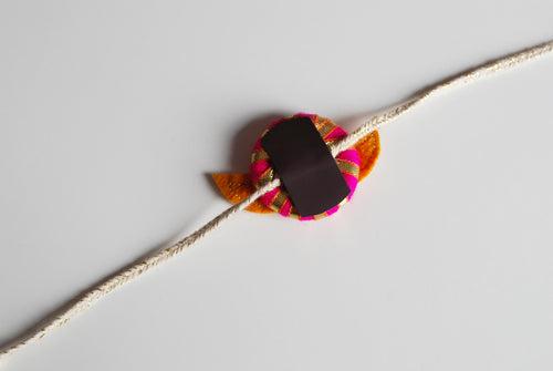 'WHITE MUCCHI' Rakhi Magnet