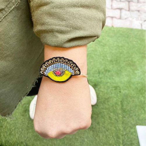 'EVIL EYE (YELLOW)' Rakhi Magnet