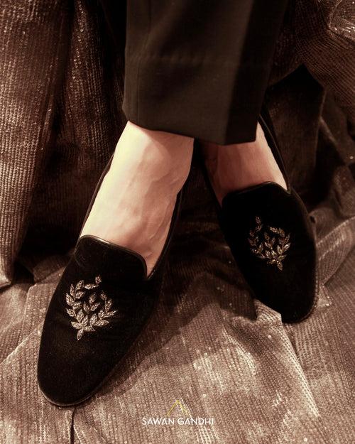 Black leaf shoes