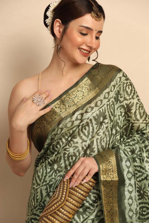 Contemporary Elegance: Green Color Cotton Silk Saree with Geometrical Motif