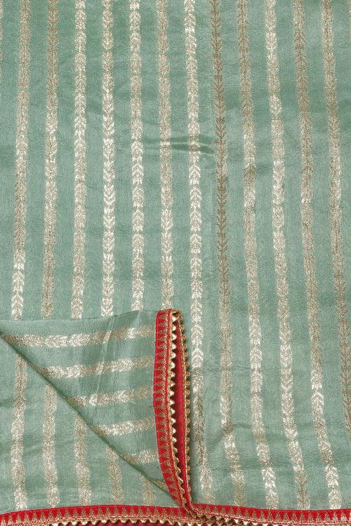 Graceful Green Silk Saree with Intricate Zari Work"