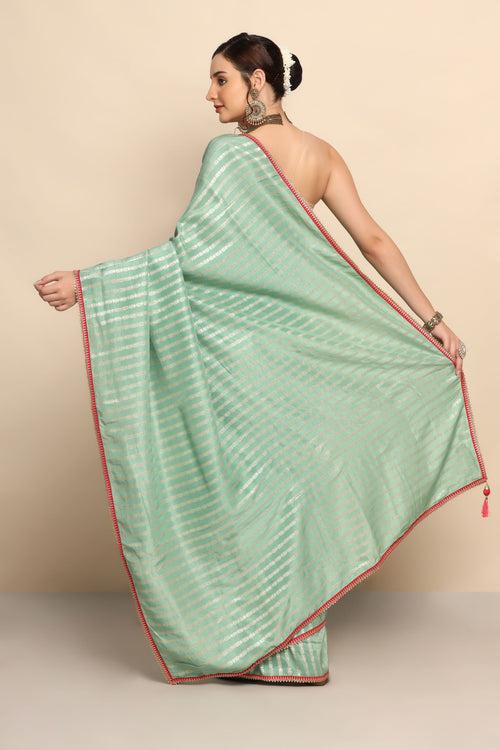 Graceful Green Silk Saree with Intricate Zari Work"