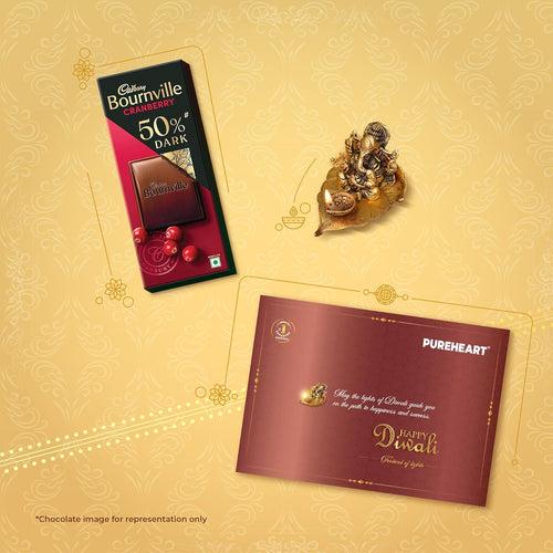 PUREHEART Diwali Gift Hamper - Natural Cashews, Fruit & Nut Nutmix, Black Raisins, Fiery Hot Cashews, Natural Almonds (80 g, each) with Bournville Dark Chocolate, Ganpati Diya and Happy Diwali Card