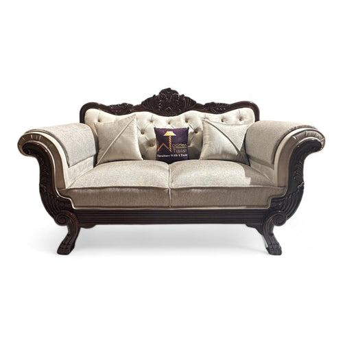 Wooden Twist Magnifica Button Tufted Hand Carved Teak Wood Soft Upholstery 2 Seater Sofa With Two Abstract Pillow