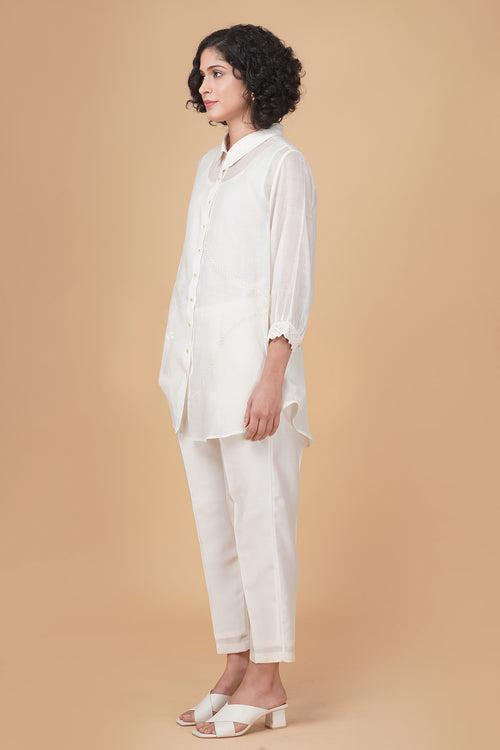 Azisai embroidery with cross  stitch embroidery shirt in cotton chanderi and straight pant in silk chanderi