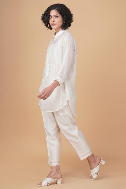 Azisai embroidery with cross  stitch embroidery shirt in cotton chanderi and straight pant in silk chanderi