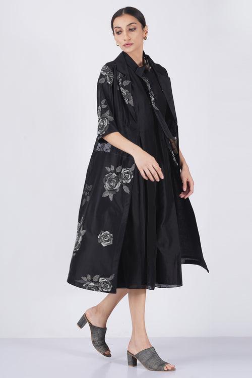 Monochrome rose print sheer waist jacket with solid black jumpsuit