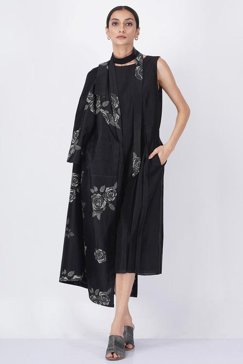Monochrome rose print sheer waist jacket with solid black jumpsuit