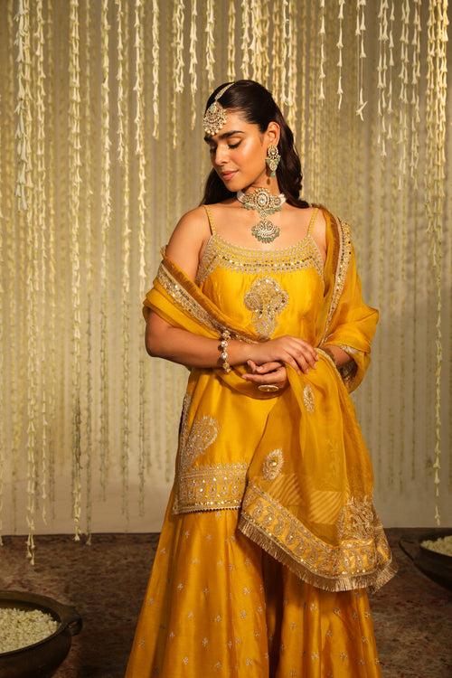 Medha Das In AABROO - GLAZE MUSTARD SHORT KURTA WITH SHARARA AND DUPATTA