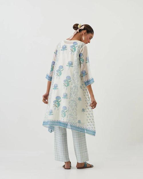 Off white hand block printed cotton chanderi short kalidar kurta set with all-over blue colored flower.