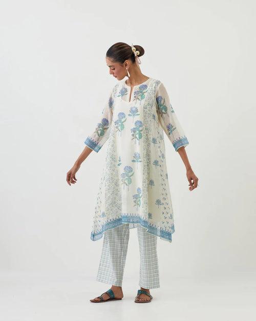 Off white hand block printed cotton chanderi short kalidar kurta set with all-over blue colored flower.