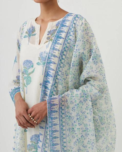 Off white hand block printed cotton chanderi short kalidar kurta set with all-over blue colored flower.