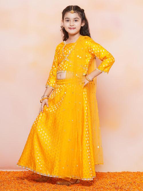 Girls Jacquard Brasso Print 3/4 th Sleeve Mustard Lehenga Choli Set