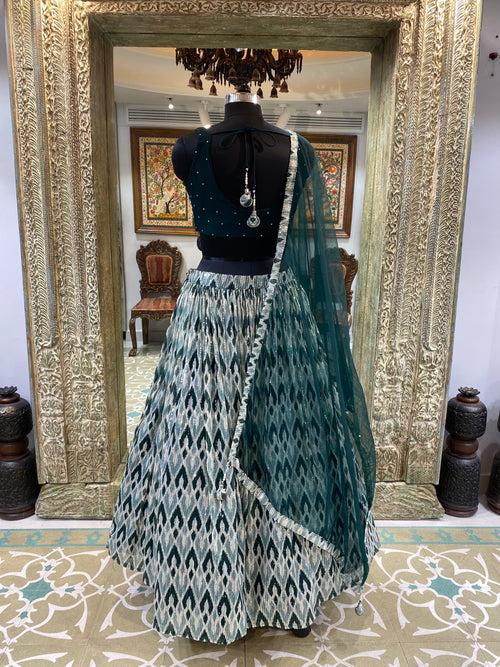 Bottle Green Net Lehenga With Hand Embroidery