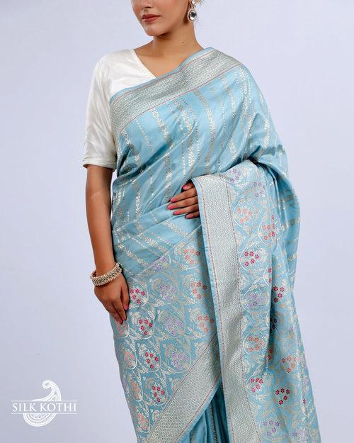 POWDER BLUE KADHWA JANGLA MEENAKARI KATAN SILK BANARASI HANDLOOM SAREE