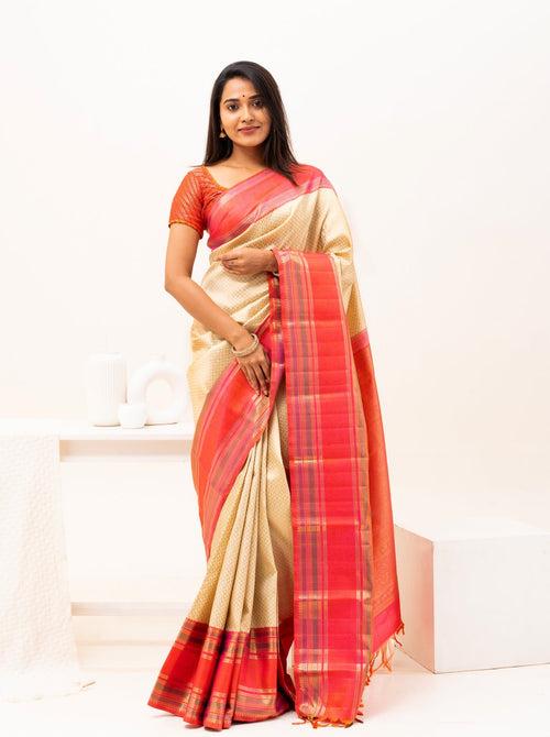 Ivory and Peach Pure Zari Kanchipuram Silk Saree