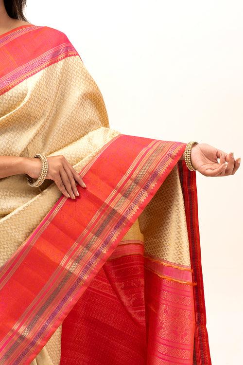 Ivory and Peach Pure Zari Kanchipuram Silk Saree