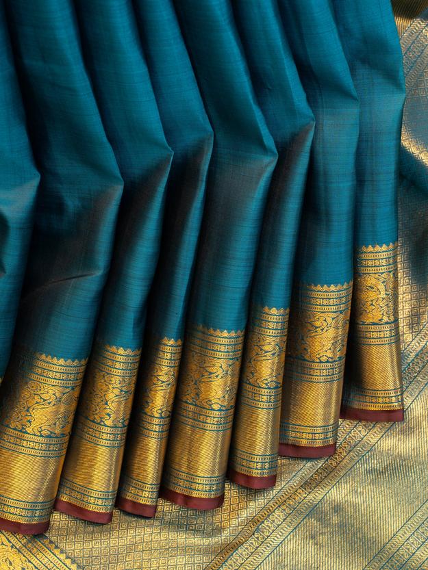 Peacock blue contrast selvedge pure Kanchipuram silk saree