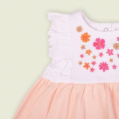 Dr. Leo sleeveless frill floral dress with a convenient back snap button closure
