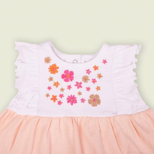 Dr. Leo sleeveless frill floral dress with a convenient back snap button closure