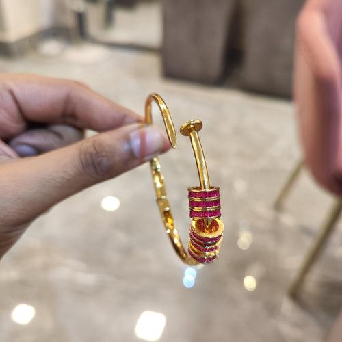 Gold Plated Nail Bracelet with Ruby Rings