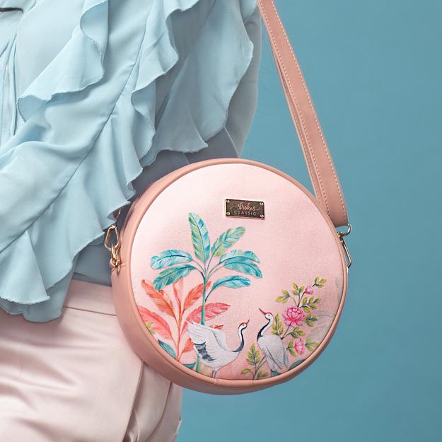 Peachy Crane Paradise Orbit Sling bag