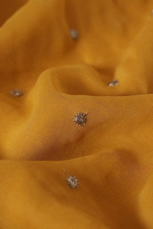 Gold Sequins With Gold Zari Small Motif Embroidery Work On Mustard Yellow Georgette Fabric