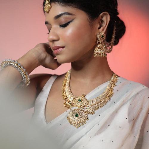 Radiant Splendor - South Indian Haram Adorned in Gleaming Gold Polish