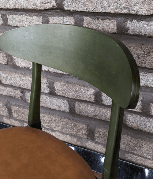 Green Chair with faux leather seat and wooden backrest