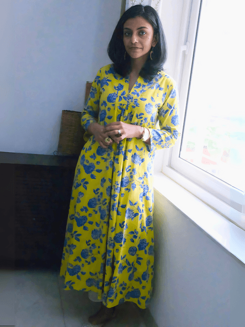 Floral printed yellow cotton V-neck kurta set with gathers