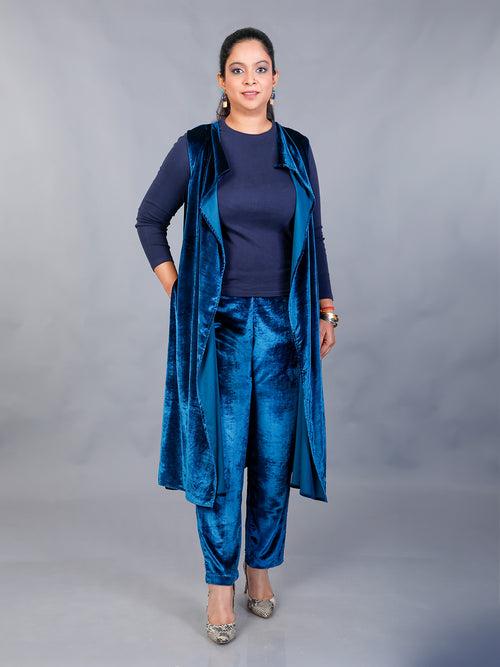 Blue velvet cape with single button closure