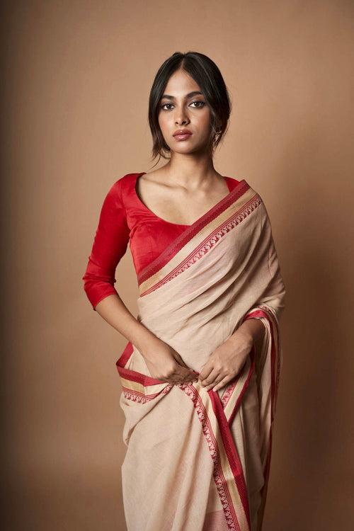 Terra I Beige cotton saree with  red  border