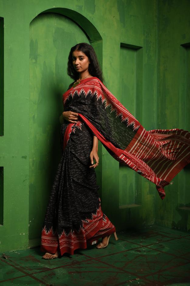 Sangvi I Black printed cotton saree with a red border