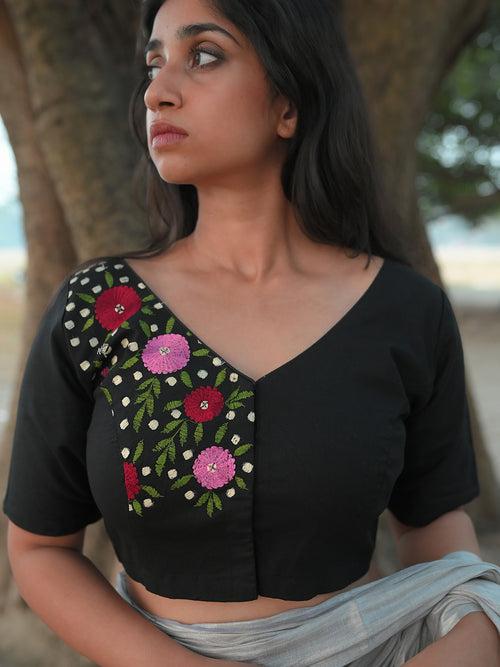 Black blouse with minimalist embroidery