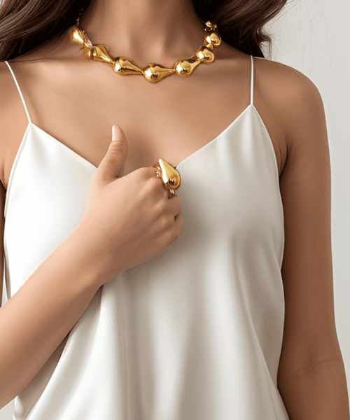 Kubbra Sait wearing MNSH Bold Gold Mini Ring