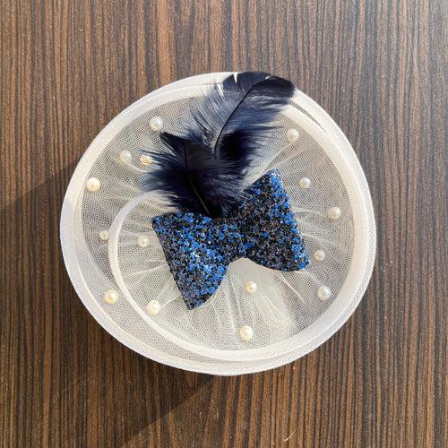 Twisted White Fascinator with Blue sparkle Bow