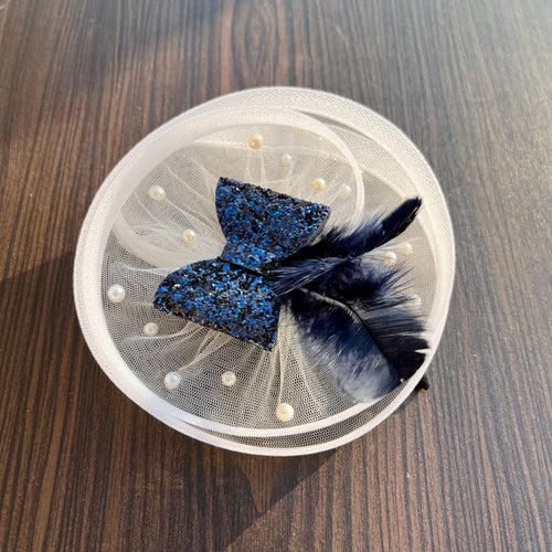 Twisted White Fascinator with Blue sparkle Bow